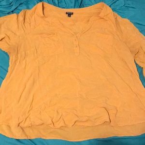 A mustard yellow shirt from TORRID size 4